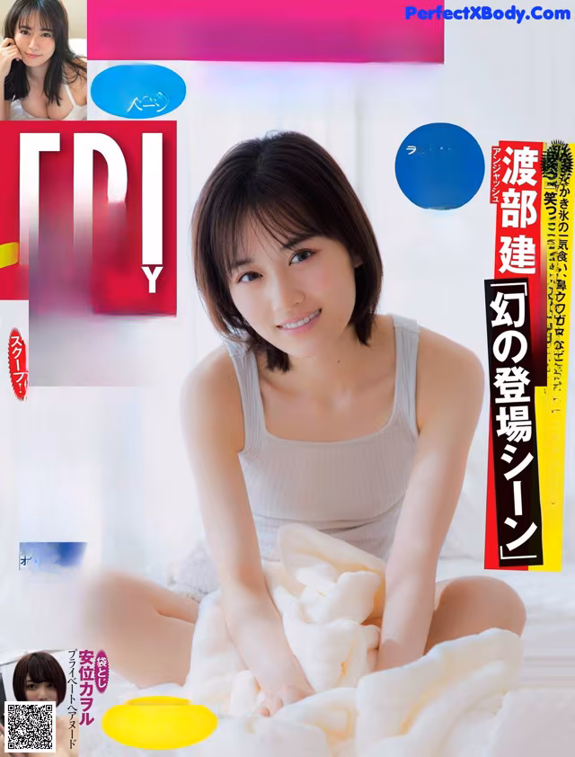 A woman sitting on top of a bed covered in a blanket.